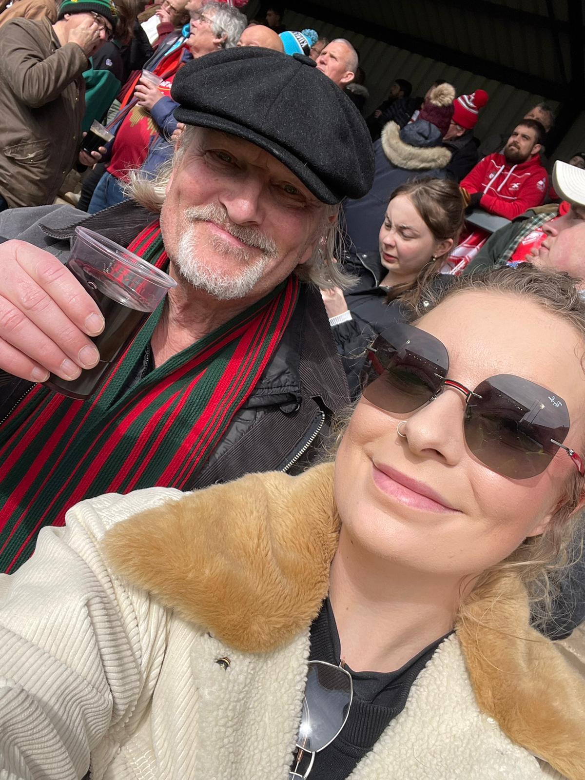 Mick and Keely Hawkes enjoy some down time at the rugby