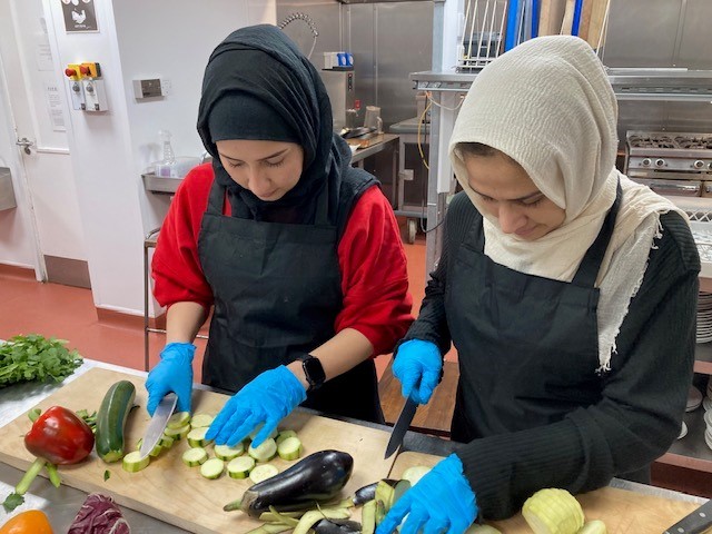 Afghan women in Hereford prepare food for a gala evening at gala evening at Broxwood Court.